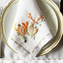 Load image into Gallery viewer, Fruit de Mer placemat in pastel colors with 100% linen napkin